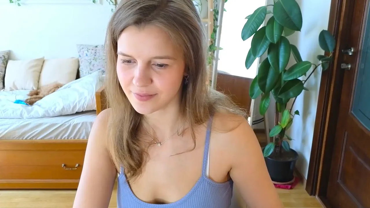 Seductive BongaCams model in a captivating pose, symbolizing high affiliate income potential