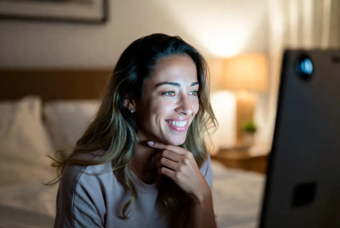 Cam model chatting with fans